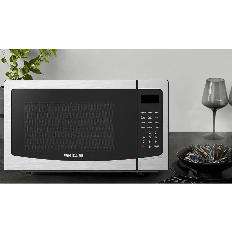 1.1 cu.ft. Countertop Microwave Oven Stainless Steel Design for Compact Kitchen Spaces Energy-Efficient Cooking with Quick Heat